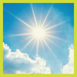 Bright sun in the sky with clouds