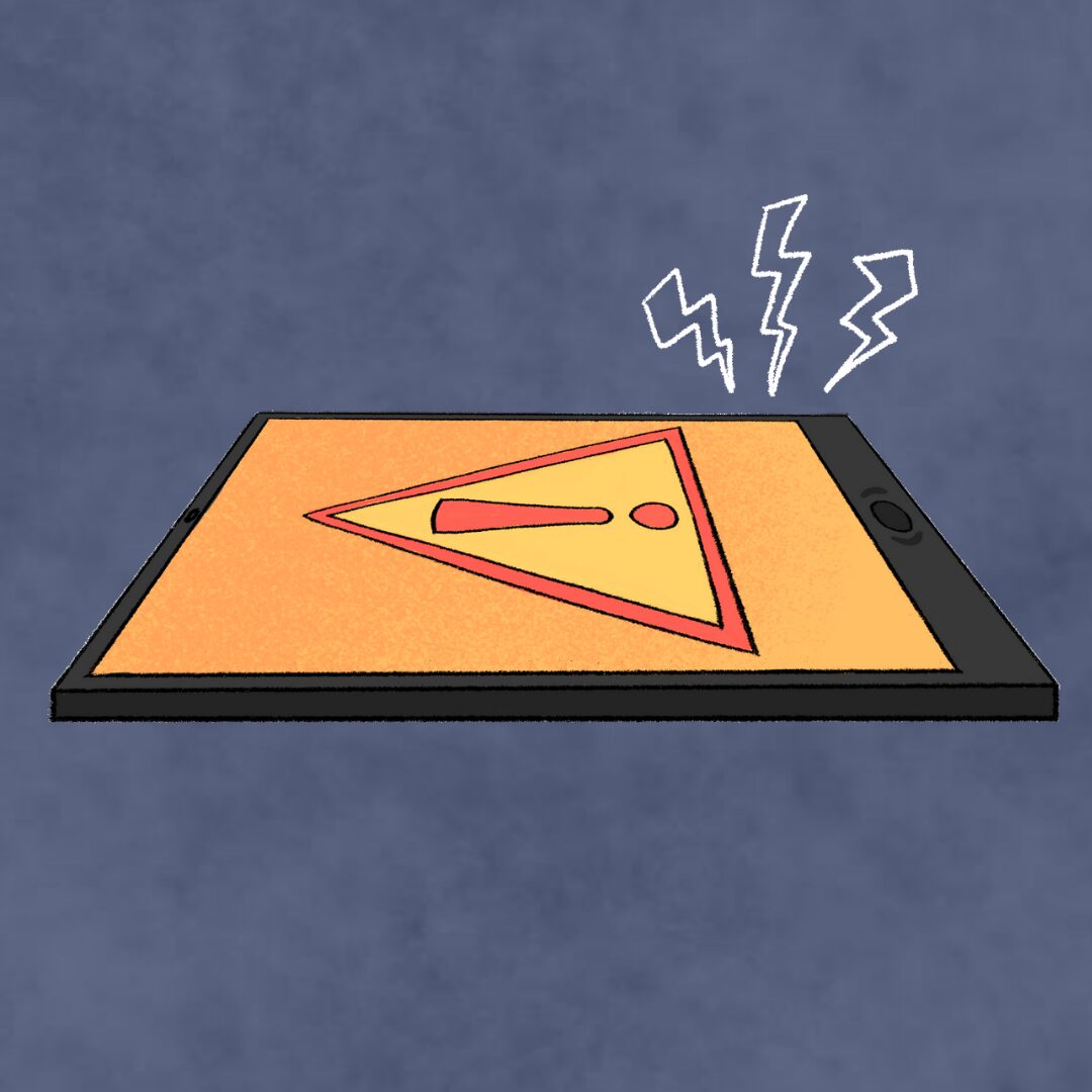 phone with a warning alert on the screen