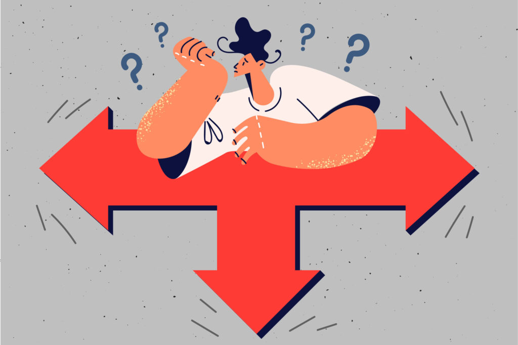 Dyn ar groesffordd yn gwneud penderfyniad